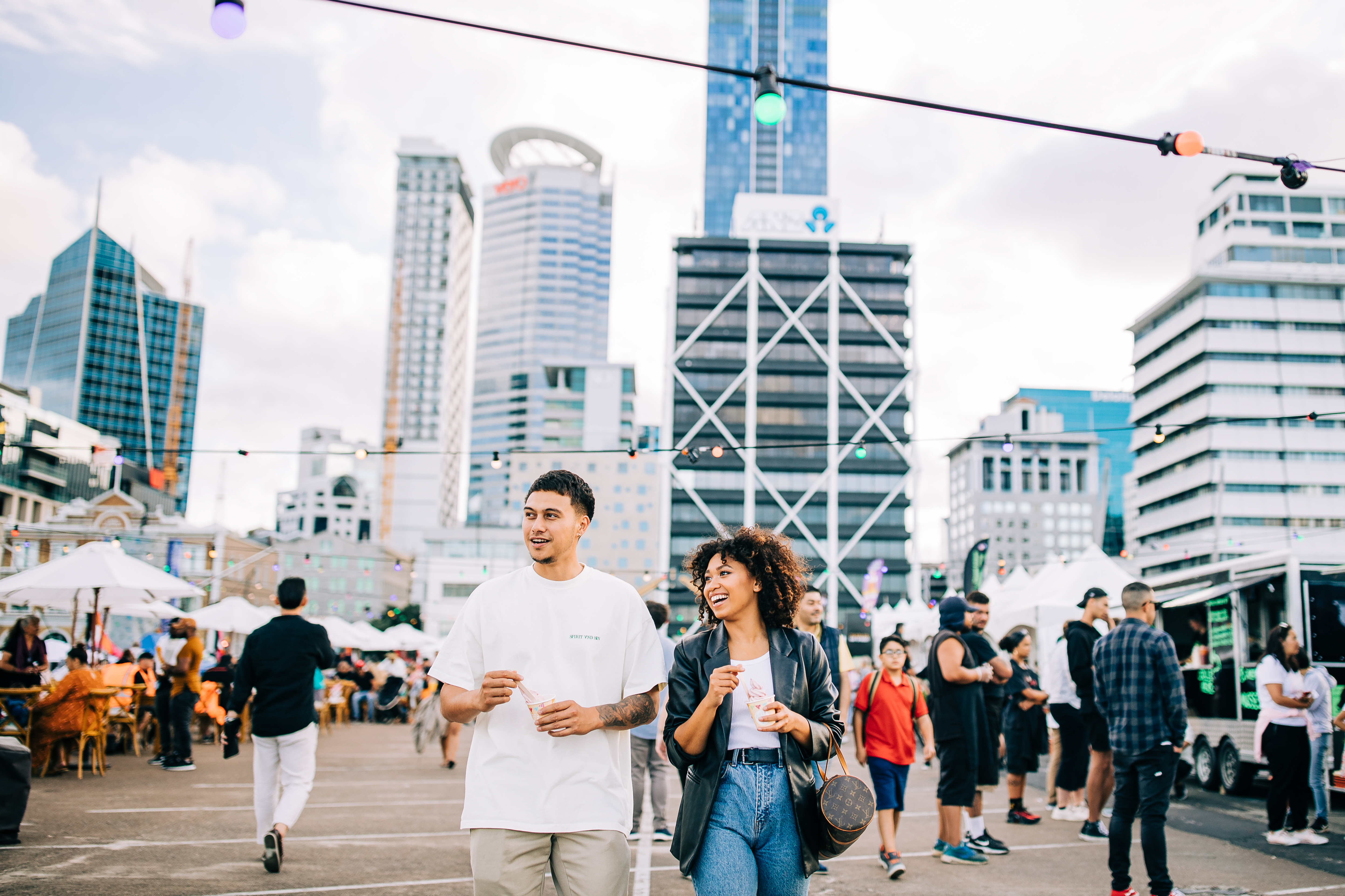 Couple Enjoying Icecream On Auckland Waterfront